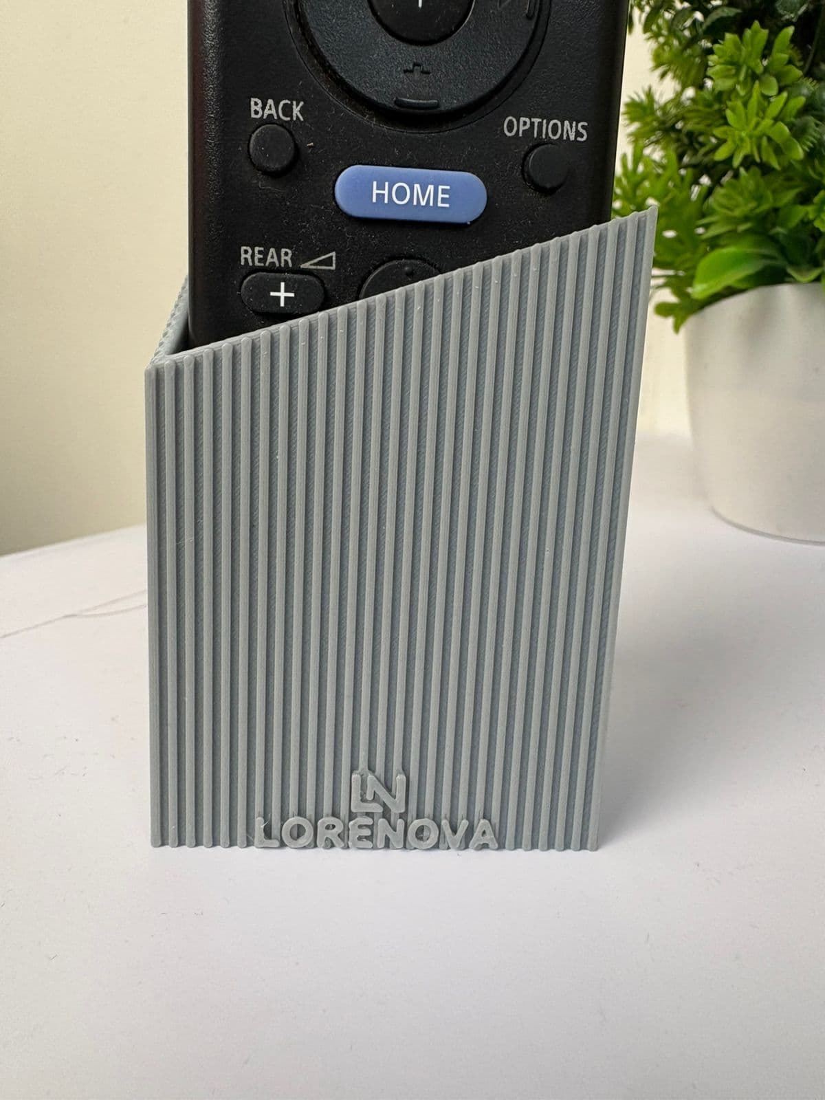 Lorenova remote holder with branding